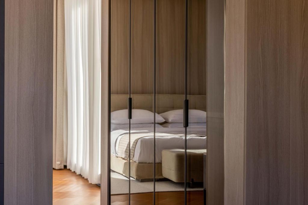 Postel nebo postele na pokoji v ubytování Taohuawu Mountain Luxury Villa Hotel