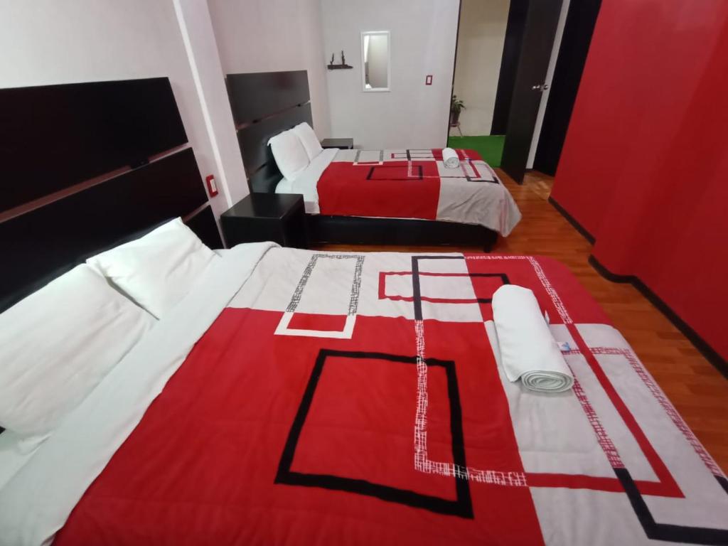 Postel nebo postele na pokoji v ubytování Hotel Posada Real