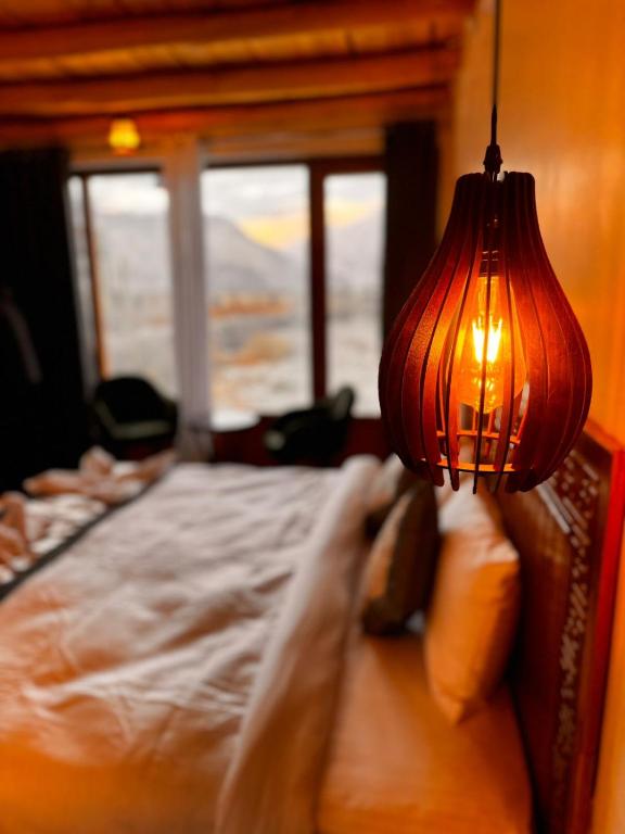 Letto o letti in una camera di Yeti Resort Hunder