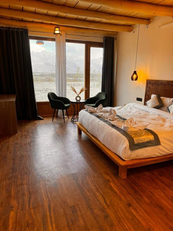 Letto o letti in una camera di Yeti Resort Hunder