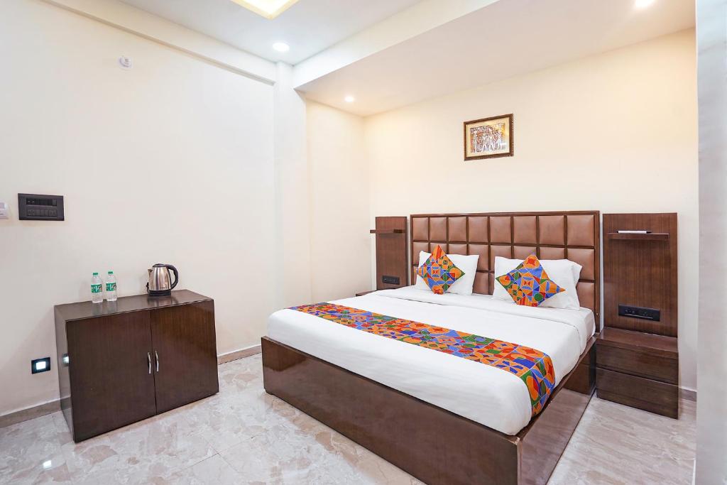 Postel nebo postele na pokoji v ubytování FabHotel Sarja Sky