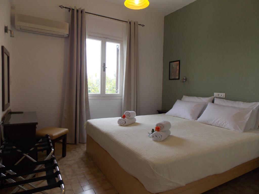 Letto o letti in una camera di Mirabella Apartments