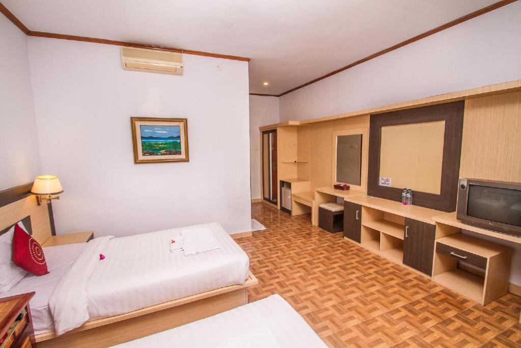 Postel nebo postele na pokoji v ubytování Puri Saron Hotel Madangan - Gianyar