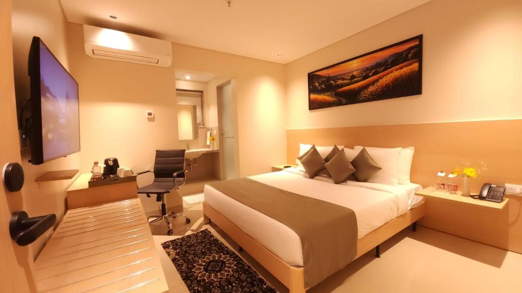 TV a/nebo společenská místnost v ubytování Morvee Hotels Durgapur