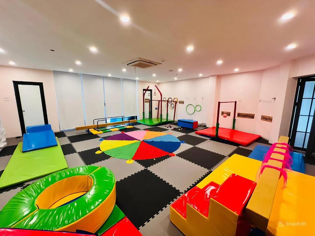 a room with a play room with a playground at Athenia Hoi An Boutique Hotel & Spa in Hoi An