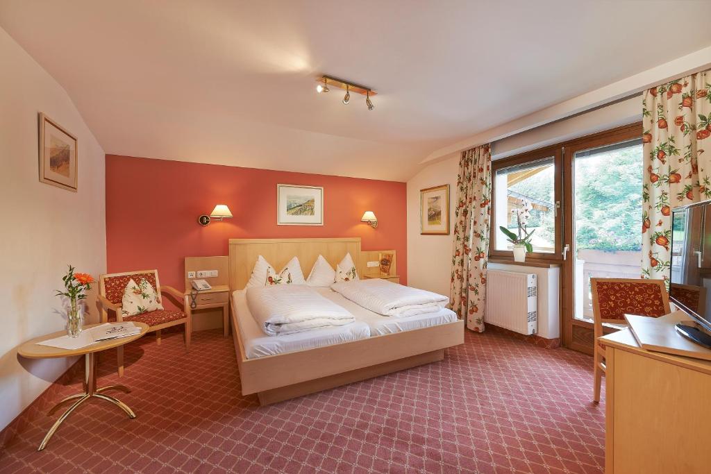 Postel nebo postele na pokoji v ubytování Hotel Steiger