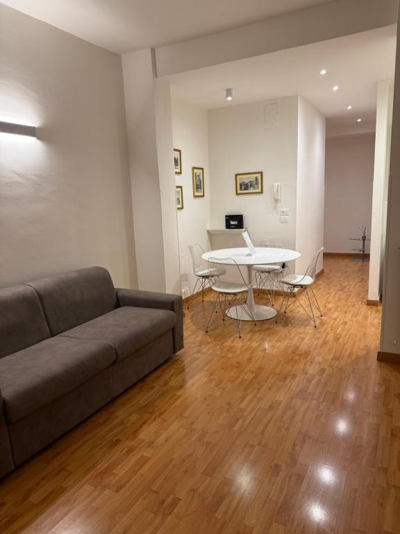 a living room with a couch and a table at Ferro di Cavallo in Lanciano