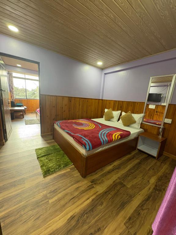 Postel nebo postele na pokoji v ubytování S Sherpa Homestay