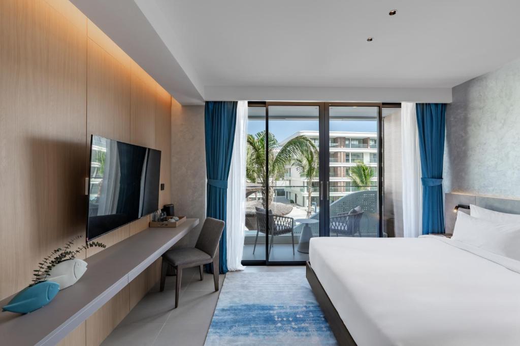 Kora Beach Resort Phuket - 13