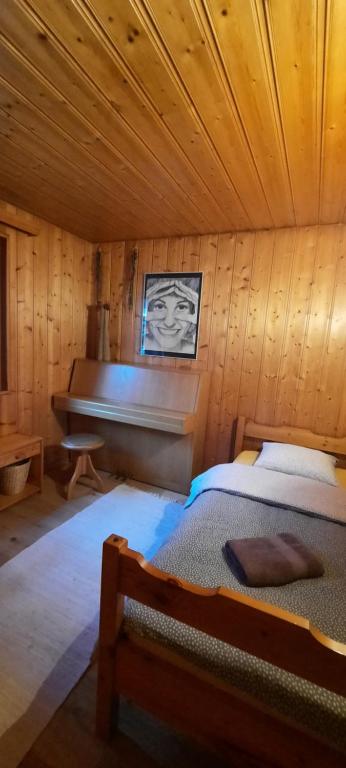 Postel nebo postele na pokoji v ubytování BnB Claudy et Elizabeth Michellod-Dutheil