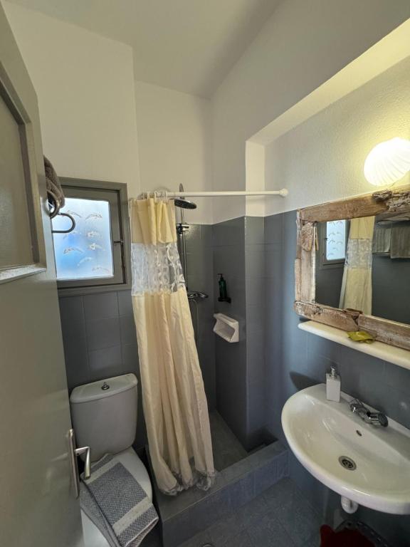 Koupelna v ubytování Madaky Hotel
