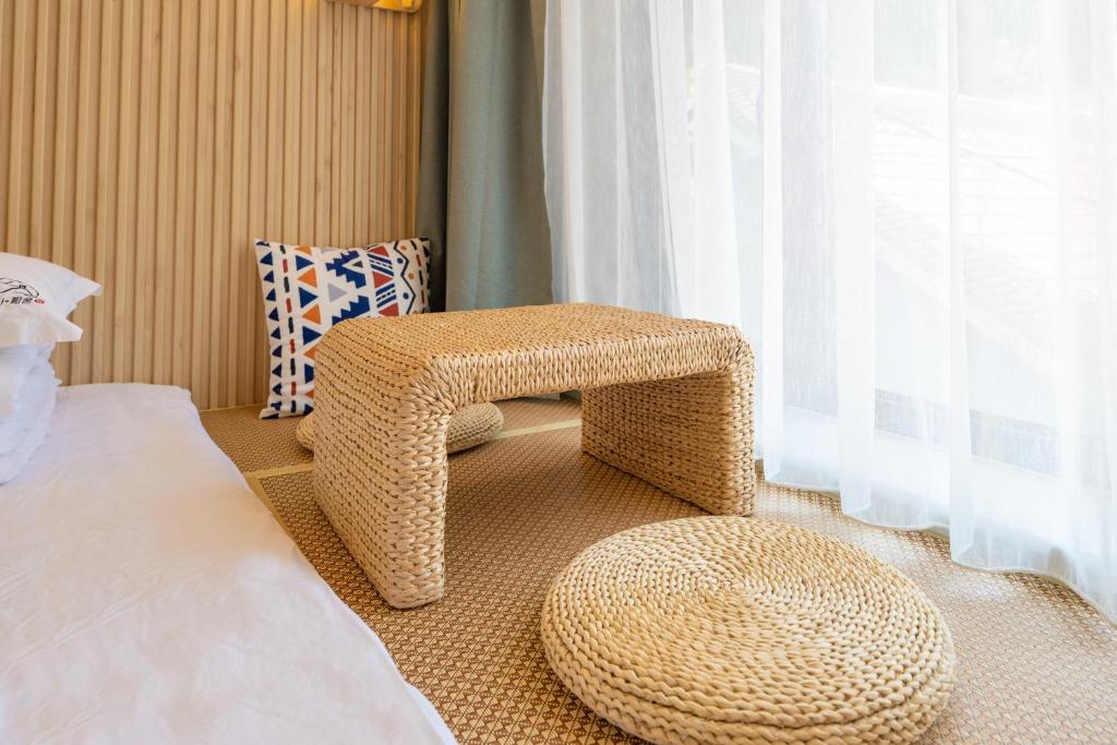 Ein Bett oder Betten in einem Zimmer der Unterkunft Mutianyu Great Wall Jingshan First House Boutique B&B