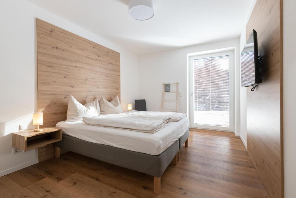 Postel nebo postele na pokoji v ubytování Arton Lachtal - Apartments Steiermark