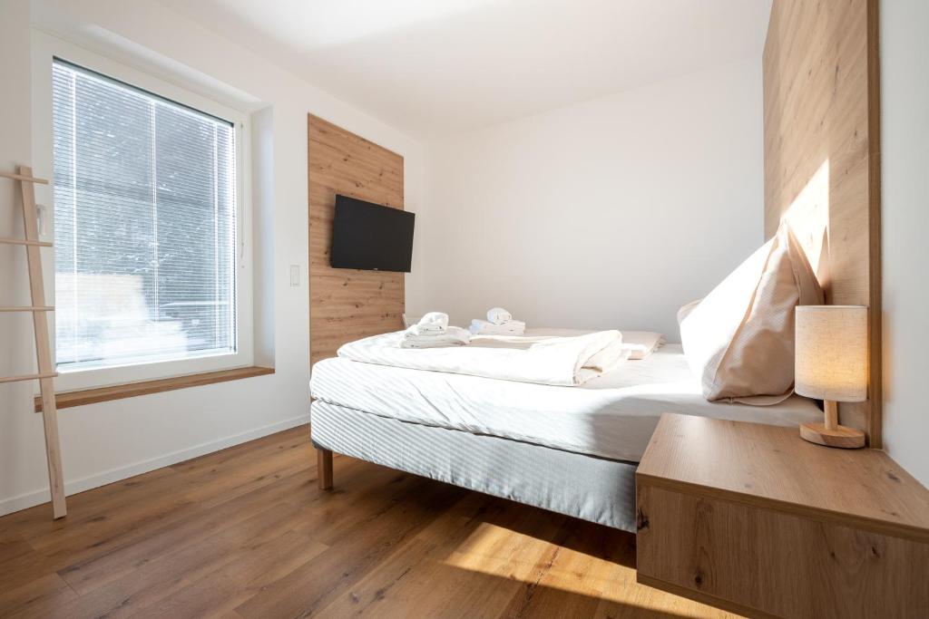 Postel nebo postele na pokoji v ubytování Arton Lachtal - Apartments Steiermark
