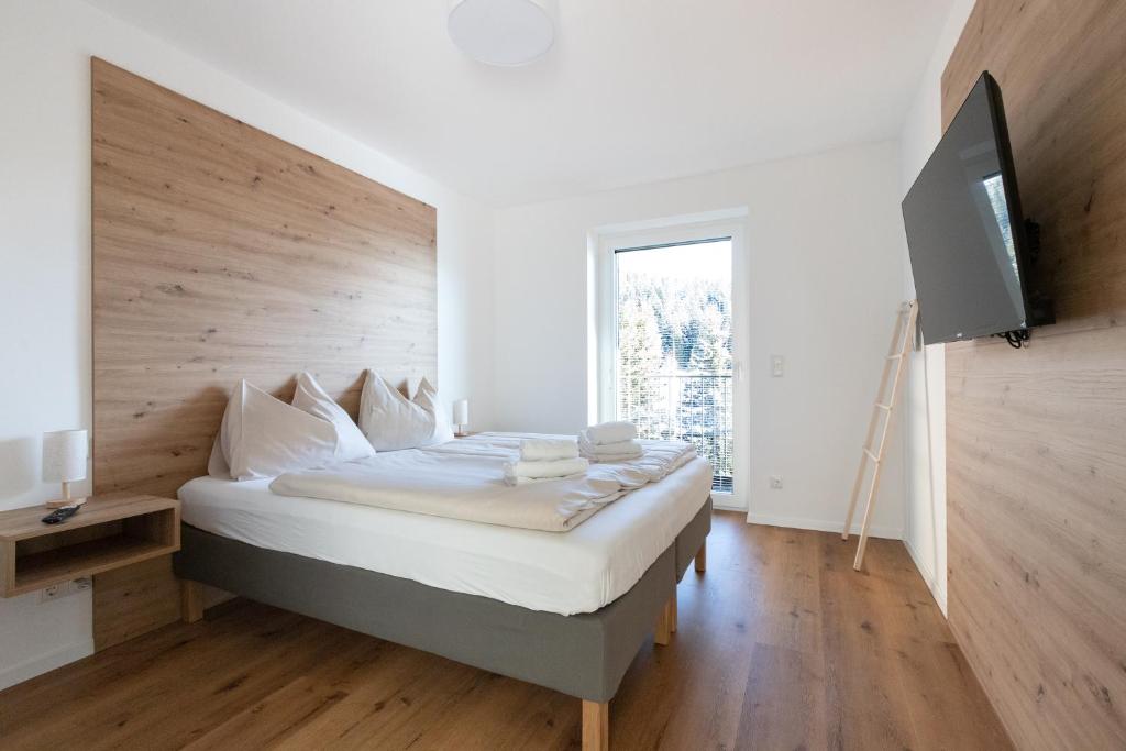 Postel nebo postele na pokoji v ubytování Arton Lachtal - Apartments Steiermark