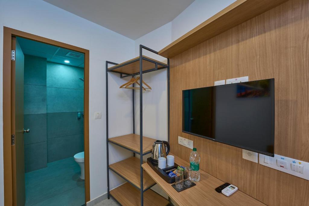 TV a/nebo společenská místnost v ubytování Sapphire Club Hub