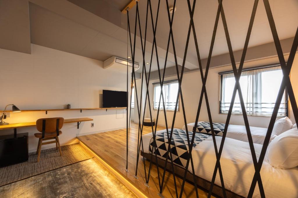 Postel nebo postele na pokoji v ubytování Fukuyama Royal Hotel