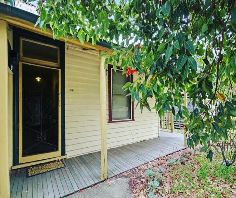 a porch of a house with a large door at Pemberton in Beechworth