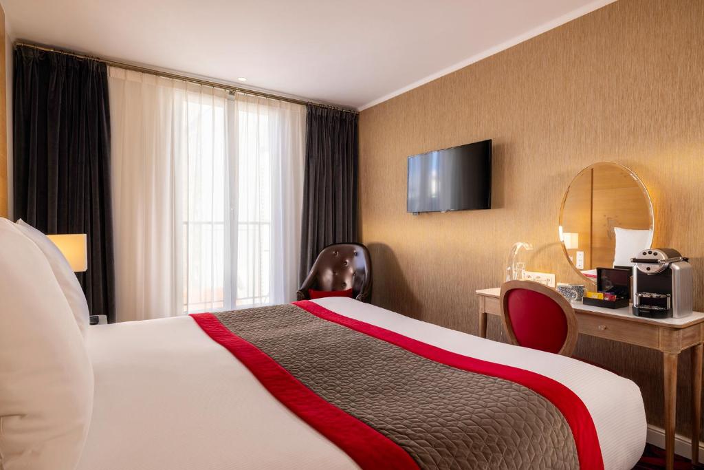 Postel nebo postele na pokoji v ubytování Hotel Muguet