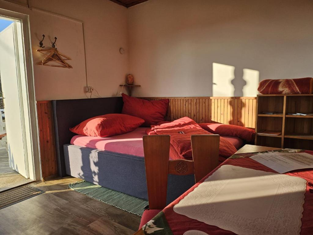 Postel nebo postele na pokoji v ubytování Alpaka Bakonya Faház