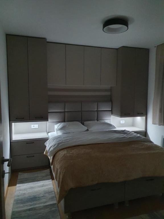Postel nebo postele na pokoji v ubytování Villa Jezero 4