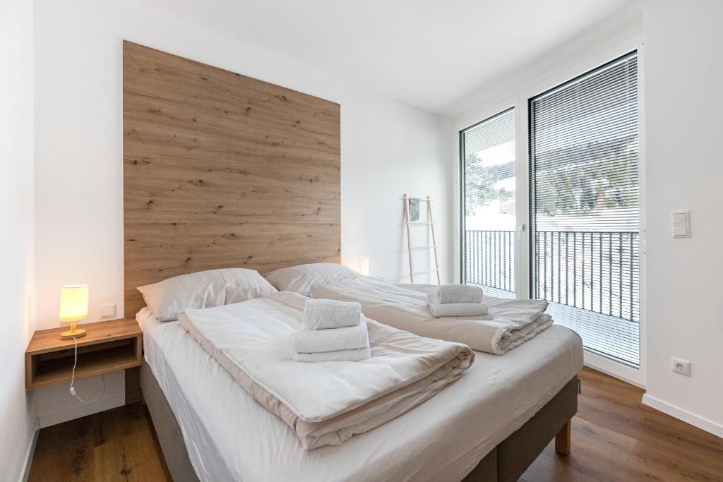 Postel nebo postele na pokoji v ubytování Arton Lachtal - Apartments Steiermark