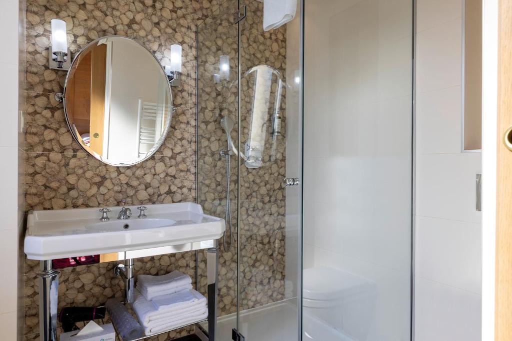 Koupelna v ubytování Hotel Muguet