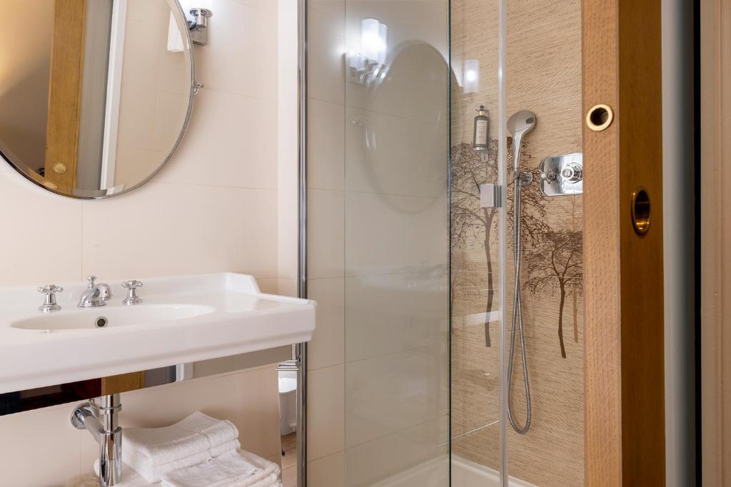 Koupelna v ubytování Hotel Muguet