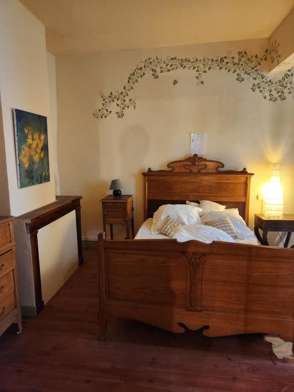 Postel nebo postele na pokoji v ubytování Gîte Groupe La Farigoule à Siguer