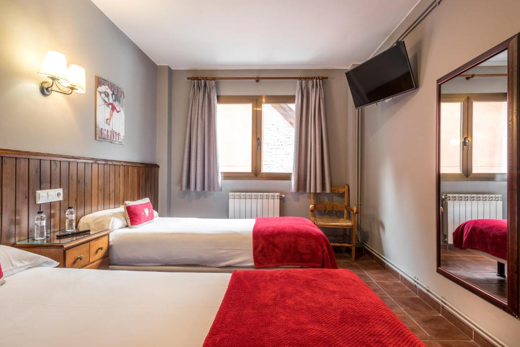 Posteľ alebo postele v izbe v ubytovaní Hotel Snö Beret
