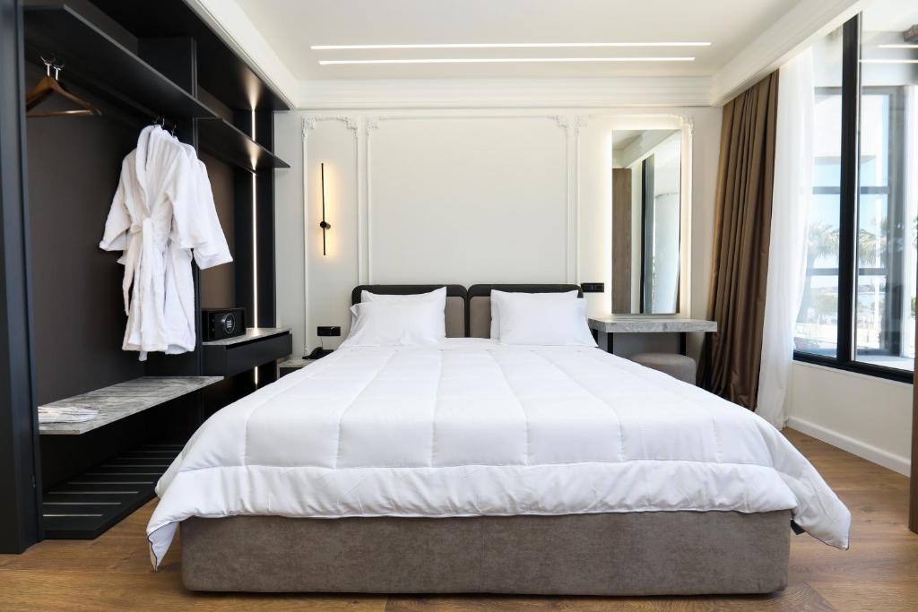 Postel nebo postele na pokoji v ubytování Hotel Adore