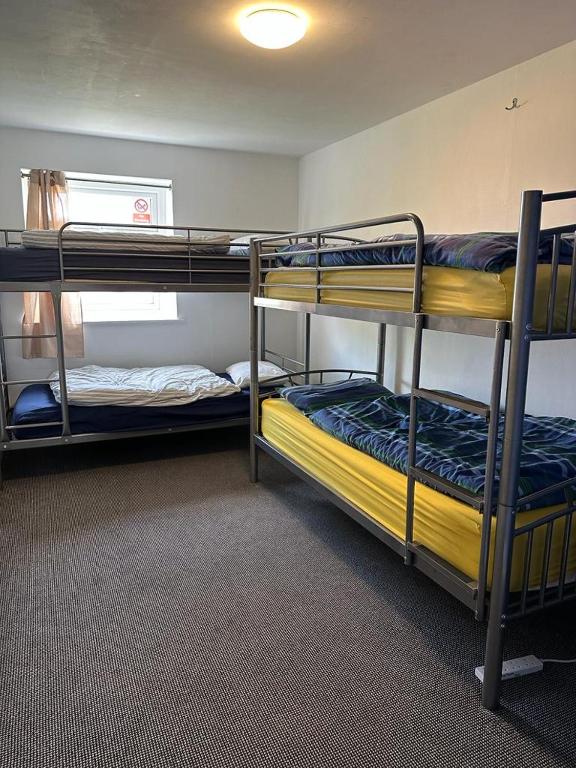 Postel nebo postele na pokoji v ubytování Blue Room Hostel Newquay