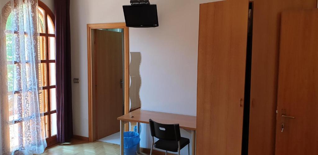 TV a/nebo společenská místnost v ubytování Villa Le Arcate