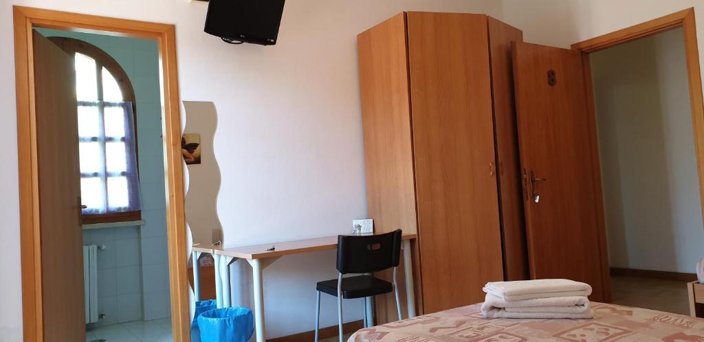 Postel nebo postele na pokoji v ubytování Villa Le Arcate
