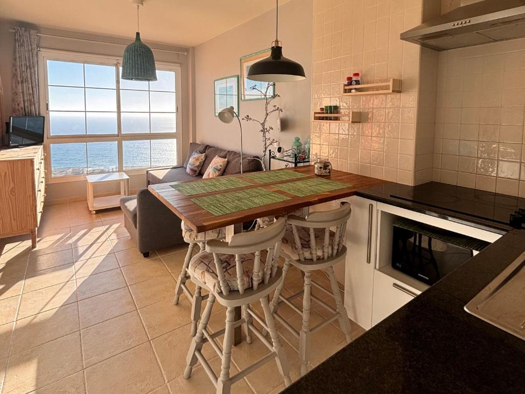 Kuchyň nebo kuchyňský kout v ubytování Penthouse Sunrise Blue Ocean View