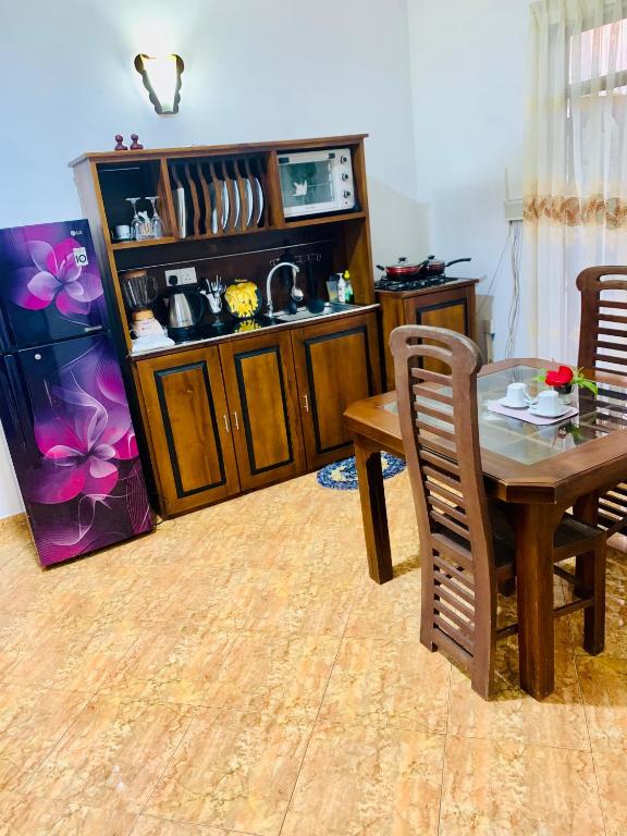 Kuchyň nebo kuchyňský kout v ubytování Moon Glow Guest