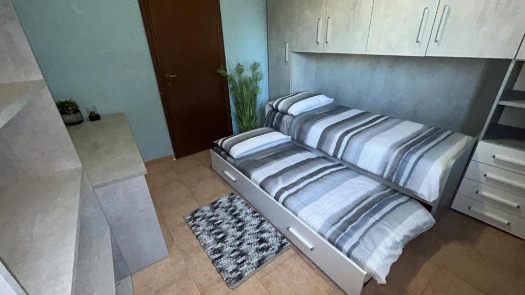Postel nebo postele na pokoji v ubytování In Centro