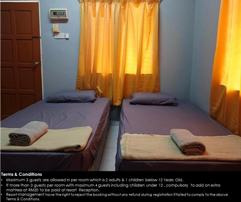 Postel nebo postele na pokoji v ubytování Resort Iman D'Semungkis