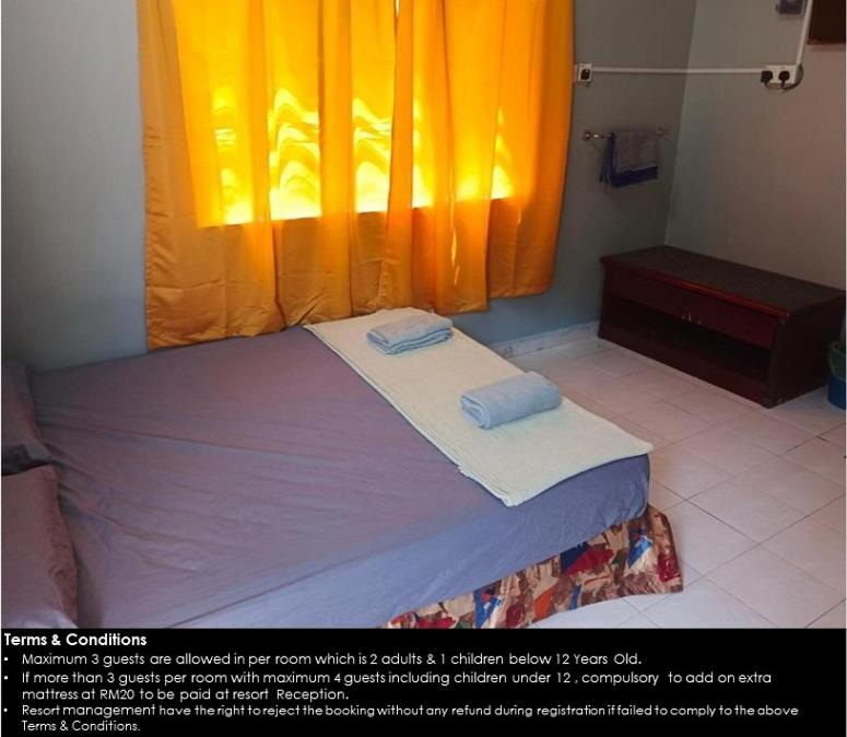 Postel nebo postele na pokoji v ubytování Resort Iman D'Semungkis
