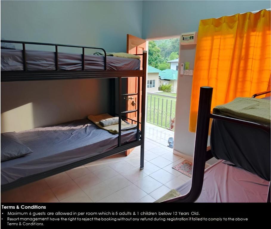 Postel nebo postele na pokoji v ubytování Resort Iman D'Semungkis