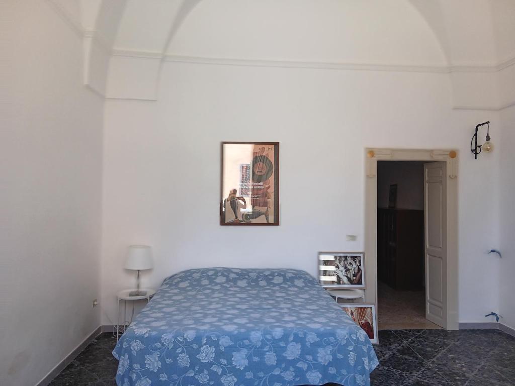 A bed or beds in a room at Casetta Rita