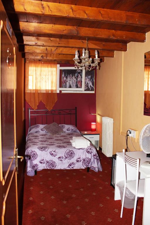 Postel nebo postele na pokoji v ubytování Hotel San Lorenzo