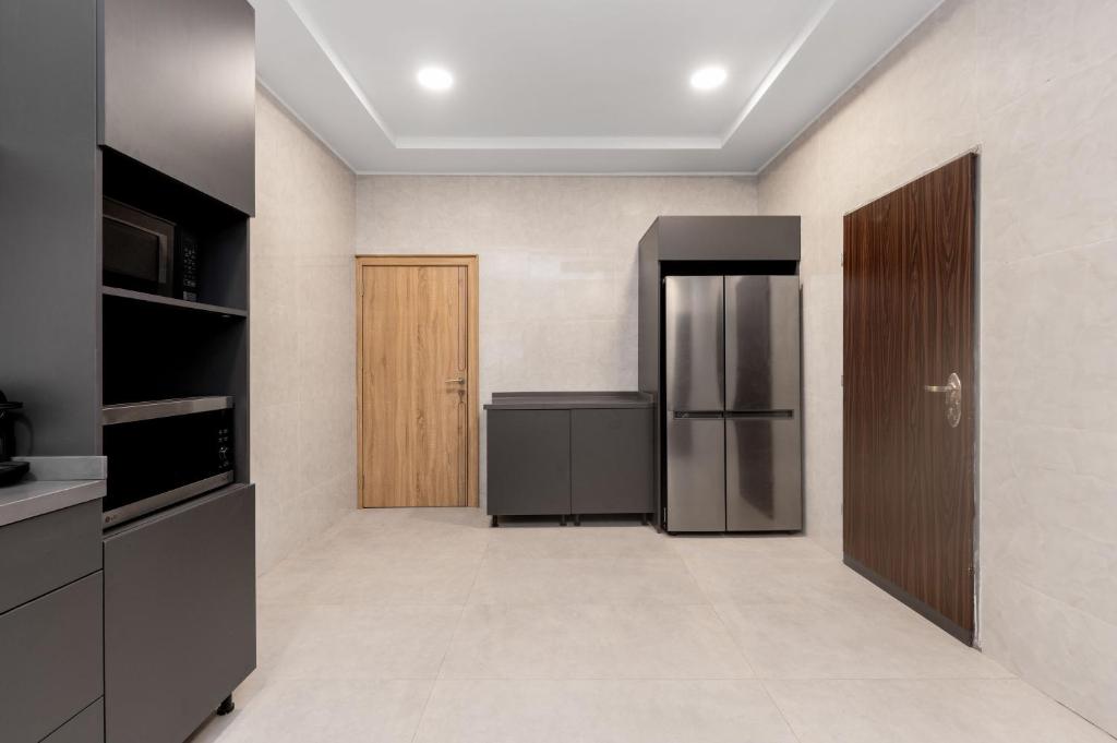 Η κουζίνα ή μικρή κουζίνα στο STP Apartments