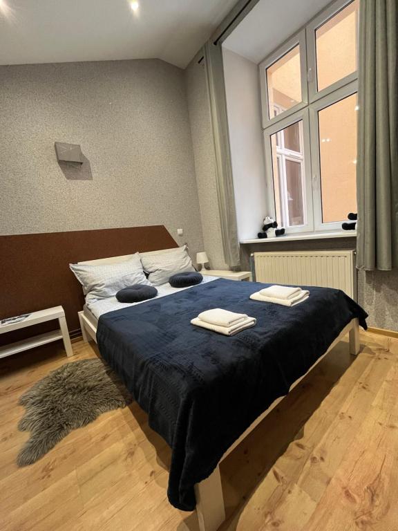 Posteľ alebo postele v izbe v ubytovaní Apart West13 Kraków