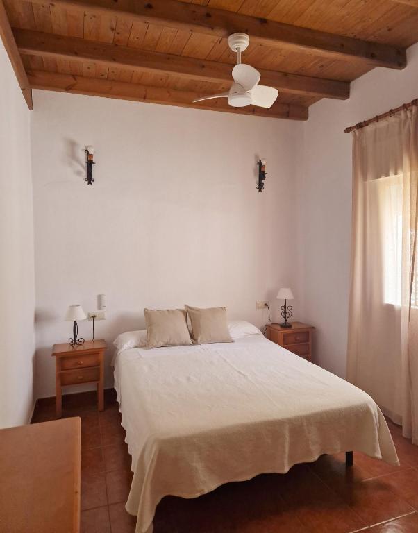 Posteľ alebo postele v izbe v ubytovaní Las Casas de Las Flores
