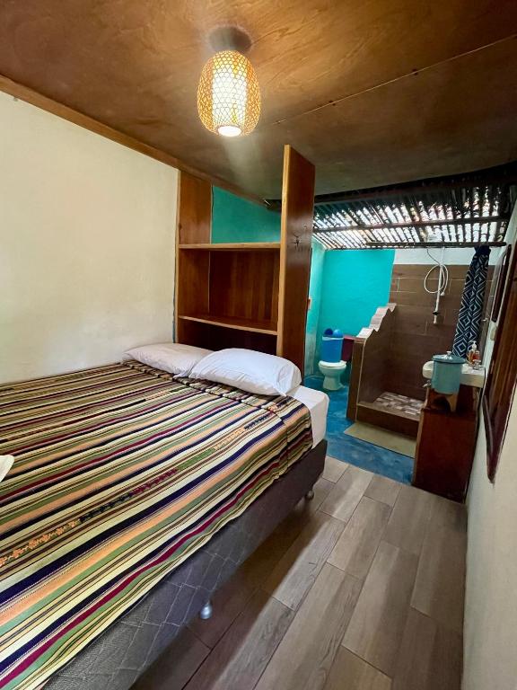 Postel nebo postele na pokoji v ubytování Hotel Mon Ami
