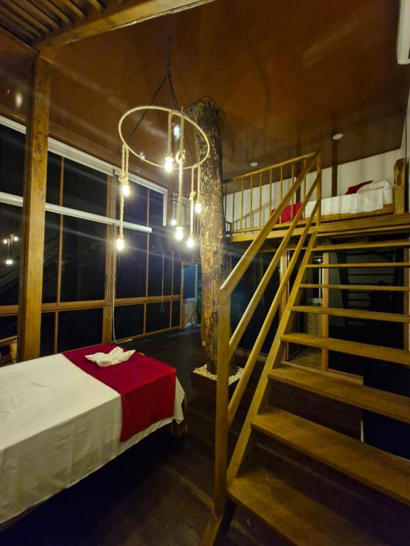Postel nebo postele na pokoji v ubytování Ecohotel Alflo Inn