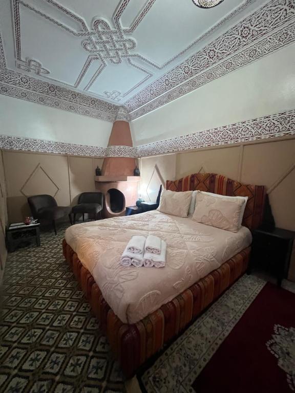 Postel nebo postele na pokoji v ubytování Riad La Perla Bianca