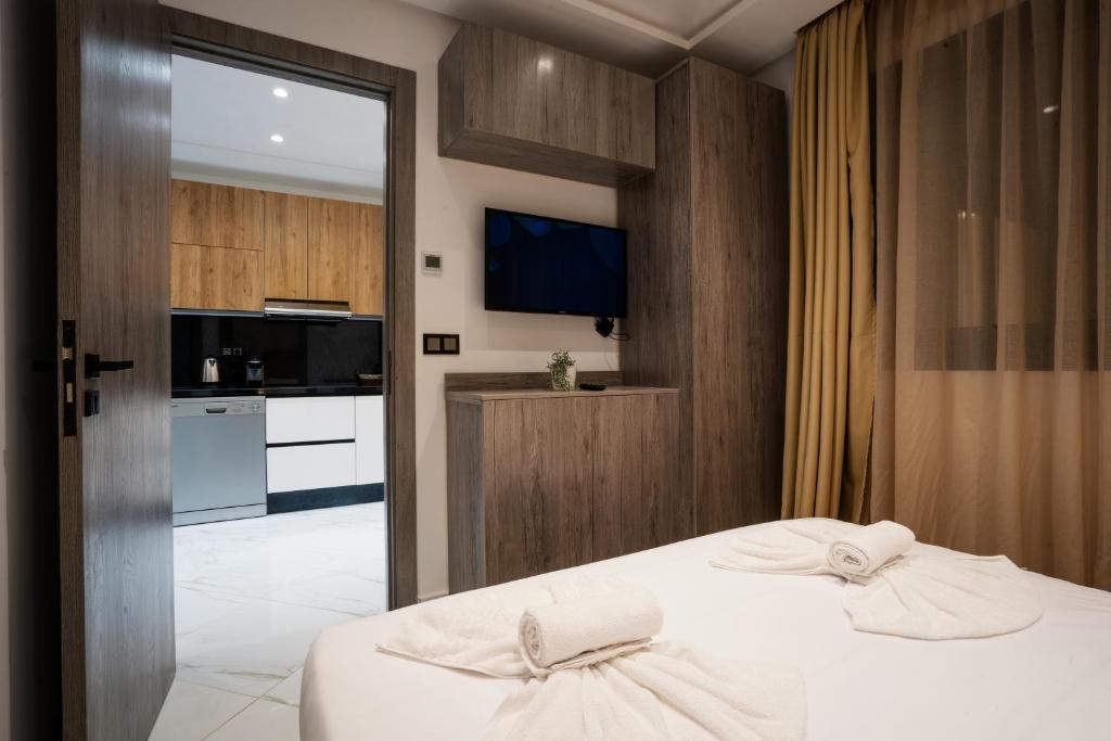 Postel nebo postele na pokoji v ubytování Amelia Appart-Hotel