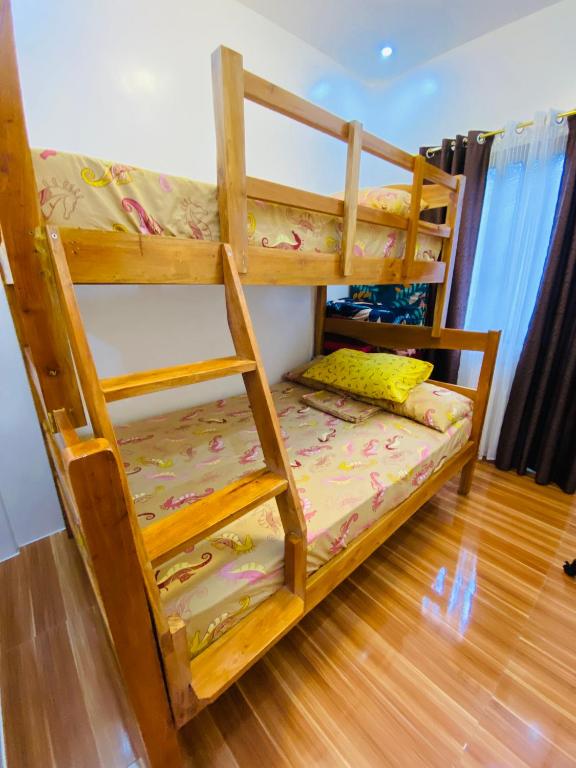 Postel nebo postele na pokoji v ubytování Lucas Transient House